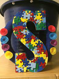Fun to make and play with. Pin By Tina Santuomo Howells On Crafts Puzzle Crafts Autism Crafts Autism Awareness Crafts