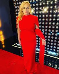 Australia's rebel wilson is best known for her funny roles, including kristen rebel wilson was born on march 2, 1980, in sydney, australia. Rebel Wilson Stuns In Glamorous Red Gown Meghan Markle Previously Wore E Online Deutschland