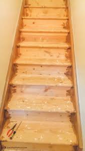 This was a simple system that worked great, and will also be how i handle it when dealing with the basement stairs too. Diy Stairs Makeover From Carpet To Wood Everyday Shortcuts