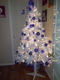 We decorated one tree in gold, silver, white. White Christmas Tree With Royal Blue Decorations Kentucky Christmas Tree White Christmas Trees Cool Christmas Trees