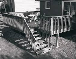 Repairing a deck board the easy way. Rebuild An Old Deck With New Decking And Railings Diy Family Handyman