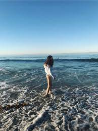 Blue Sea Girl Beach Photos Beach Pictures Outdoors Adventure
