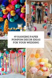 Paper chandeliers of tissue orbs stapled to narrow ribbon and hung from the ceiling will elicit oohs and aahs from your guests and maybe even a few delighted squeals—the perfect, happy soundtrack for your big day. 49 Hanging Paper Pompoms Decor Ideas For Your Wedding Weddingomania