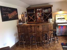 Lower table has multiple tiered wine. Retro Home Bar Vintage Home Pub Peppermill Interiors