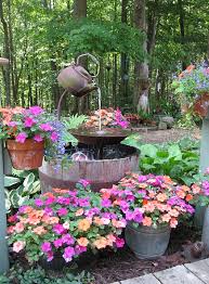 Make These Up Cycled Water Fountains For The Backyard