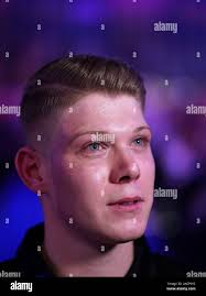 Nico Kurz is interviewed following his victory over Joe Cullen during day  eight of the William Hill World Championships at Alexandra Palace, London  Stock Photo