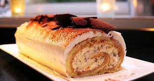 Cette Annee J Ai Pris Un De Mes Desserts Preferes Le Tiramisu Et Je L Ai Transforme En Buche Tiramisu Sans Embu Buche Tiramisu Herve Cuisine Recette Buche