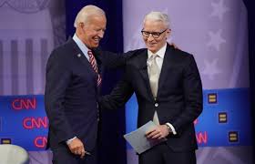 Joe Biden And Cnn S Anderson Cooper Mocked For Breaking Social Distancing Rules During Town Hall Break The Independent