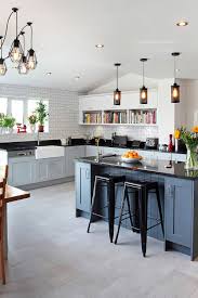 With dark gray cabinets and exposed wood countertops, your kitchen will have natural warmer and lighter features. 50 Black Countertop Backsplash Ideas Tile Designs Tips Advice