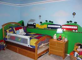 Train Themed Bedroom For A Toddler Love The Train Mural Though Its Cartoonish And Not To My Tastes I Train Bedroom Decor Boys Room Mural Kids Interior Room