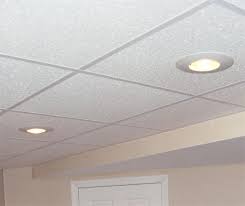 Most recessed can lights come with adjustable mounting arms that can either be nailed between joists, or in your case snapped over the grid main runners. Drop Ceiling Recessed Lighting Designs Decoratorist 29507