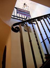 Australian residential architectural styles have evolved significantly over time, from the early days of structures made from relatively cheap and imported corrugated iron (which can still be seen in the roofing of historic homes) to more sophisticated styles borrowed from other countries, such as the victorian style from the united kingdom, the georgian style from north america and europe and. Spanish Wrought Iron Stair Railing Details In Santa Barbara California Mediterranean Entry Santa Barbara By Santa Barbara Home Design Houzz