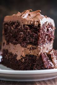 A Decadent And Moist Chocolate Cake Recipe With The Easiest Whipped Chocolate Frostin Chocolate Cake Recipe Moist Chocolate Cake Recipe Homemade Chocolate Cake