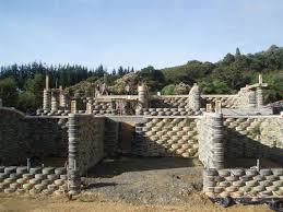 Made From Old Tires Earthship Earthship Home Earthship Plans