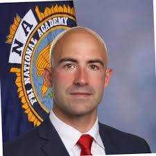 Today as a platoon, we celebrated the promotions of two officers. Sergeant Lee  Cravens was promoted to Captain (training coordinator) and Officer Matt  Eichbrecht was promoted to the explosives…