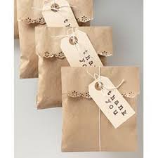 On the front of the bag, the words thank you in cursive font have been hot stamped in gold metallic foil. Favor Bags And Thank You Gifts Paper Gifts Gifts Small Gifts