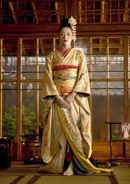 Below i have attached a photo of her, she is the one in the orange kimono. Memoirs Of A Geisha Photo Memoirs Of A Geisha Memoirs Of A Geisha Geisha Japanese Geisha