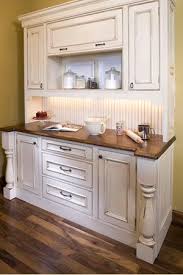 Bake Center With Distressed White Enamel Cabinets And Walnut Countertops Kitchen Remodel Kitchen Remodel Photos Home Kitchens