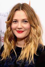 Strawberry blonde hair with dark underlayers if you are lucky enough to have long, healthy hair, sleep in some chunky rollers overnight for this fancy, wavy hairstyle that positively stuns in shades of reddish blonde. 15 Strawberry Blonde Hair Color Ideas Pictures Of Strawberry Blond Celebrities