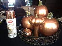Rose Gold Pumpkins Use Metallic Copper Krylon Spray Paint To Evenly Coat Clean Dry Pumpkins Tape Off Stalks With Blue Pumpkin Gold Pumpkins Painted Pumpkins