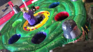 Players then hit the moles on their heads as fast as they can so that the opposite player has more moles above. Human Whack A Mole Inflatable Bouncy Castle Hire In Liverpool Widnes Wirral St Helens Merseyside