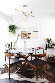 Mid Century Modern Inspired Dining Table With A Sculptural Wooden Base And A Round Glass Tablet In 2020 Affordable Home Decor Dining Room Small Mid Century Dining Room