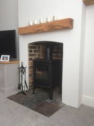 Get quote for your dream fireplace by building it virtually using the design centers linked below. Log Burner With Oak Mantlepiece Deepcut Surrey Log Burner Installation Hampshire
