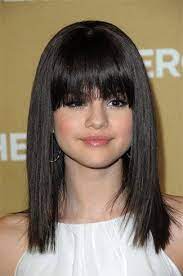 Poker Straight Hair With Fringes Hairstyles Haircut Selena Gomez Hair Thick Hair Styles Haircut For Thick Hair