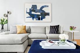 White throw pillows on a grey sofa is a classic combination. 15 Ways To Style A Grey Sofa In Your Home Decor Aid