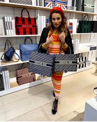 A Favorite Dior Tote Is About To Get Smaller Pursebop The book tote was inspired by a drawing produced by marc bohan in 1967, which was located in the house's archives. a favorite dior tote is about to get