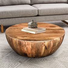 Beige medium round wood coffee table with dusty wax coating. Round Dark Brown Mango Wood Coffee Table Overstock 11828940