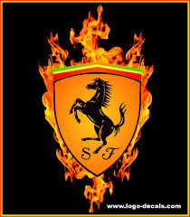 The hood is long and lovely, with a bulging center crease that perfectly frames the iconic prancing horse emblem. Ferrari Decals Ferrari Emblem Ferrari Logo