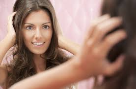 Growing out layered hair involves gradually trimming the longest layer until it is the same. How To Grow Out Layers Your Hair Survival Guide Stylecaster