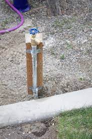 To keep the post stable, run some threaded rod crosswise through the bottom of the post, dig a shallo… How To Make An Extended Outdoor Faucet To Your Garden