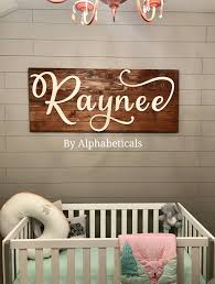 Nursery walls are a beautiful blank canvas just waiting to be filled with little decorative touches. Nursery Name Sign Girl Baby Boy Wooden Letters For Wall Decor Etsy In 2021 Wooden Letters For Nursery Wall Letters Nursery Letters For Wall Decor