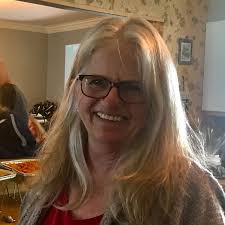 Redacted person as a nurse in the 1880s