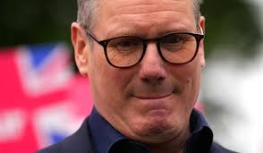 Ómós do Ken Whelan, iriseoir polaitíochta mór le rá