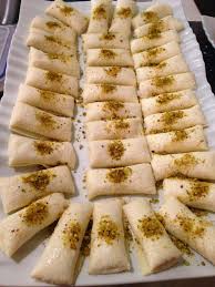 Sweet Cheese Rolls Halawet El Jibn Recipe Food Syrian Food Middle Eastern Desserts