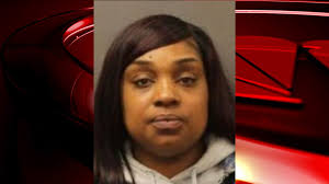 Albany woman allegedly hit car with wooden stick