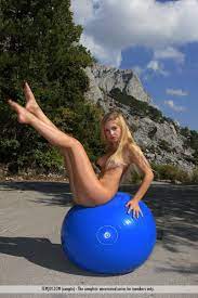 The Naughty Blonde Ofelia Femjoy Doing Hot Exercises Naked On The Fit Ball  Outdoor / DefineBabe.com