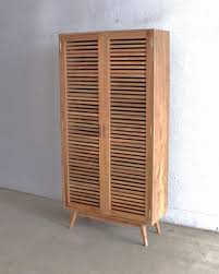 ← christmas wall art decor. Tall Wood Shoes Cabinet With Shutter Doors And Mid Century Style Tapered Legs Wooden Shoe Cabinet Wooden Shoe Racks Shoe Cabinet