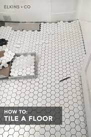 Steps On How To Tile Your Bathroom Floor Hexagon Tile How To Tile Bathroom Floor Hexagon Tile Bathroom Bathroom Floor Tiles Bathrooms Remodel