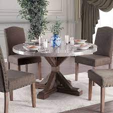 There are flexible table options, including pullout leaves, that are meant to accommodate a different number of guests within a room. Bridgen Round Dining Table Furniture Of America Furniture Cart