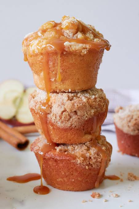 Magic Stay-Fresh Apple Muffins stacked with a sparkling sugar crust