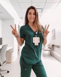 Image May Contain 1 Person Standing Phone And Indoor Doctor Outfit Nursing Fashion Female Doctor