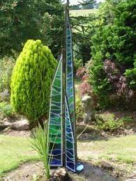 Stained Glass Garden Sculptures Google Search Gardensculptures Stainedglassgarden Stainedglasslight Glass Garden Stained Glass Glass Garden Art