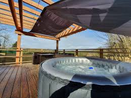 The cabin can sleep 10 guests and has four bathrooms. 17 Gorgeous Airbnbs With Hot Tubs In Ireland For 2021