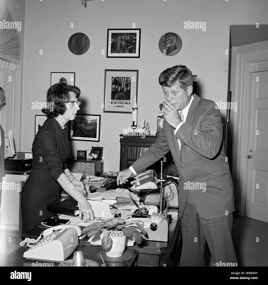 President Kennedy, Presidential Secretary Evelyn Lincoln. President John F. Kennedy and Evelyn Lincoln, his personal secretary, in her office. White House, Washington, D.C Stock Photo - Alamy