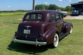 Image result for Trojan Maroon 1939 Oldsmobile