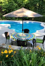 Tablecloth with hole and velcro for unremovable umbrella. Umbrella Tablecloths Outdoor Entertaining With Style And Ease